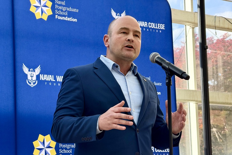 Defense Advanced Research Projects Agency (DARPA) Director Stephen Winchell addresses graduates, faculty and leadership from the U.S. Naval War College (NWC) and Naval Postgraduate School (NPS).